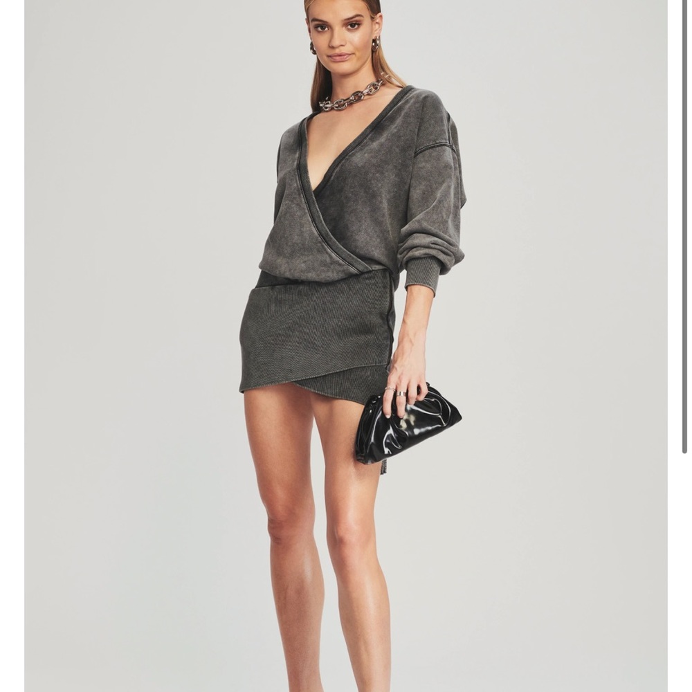 The Nash Dress offers a relaxed silhouette with a deep-v neckline.